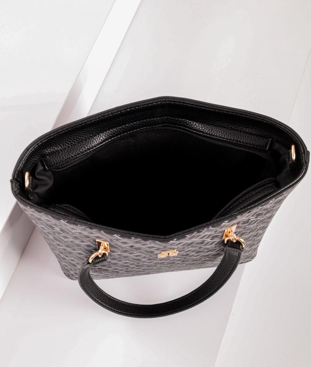 شنطة يد حريمي تومي