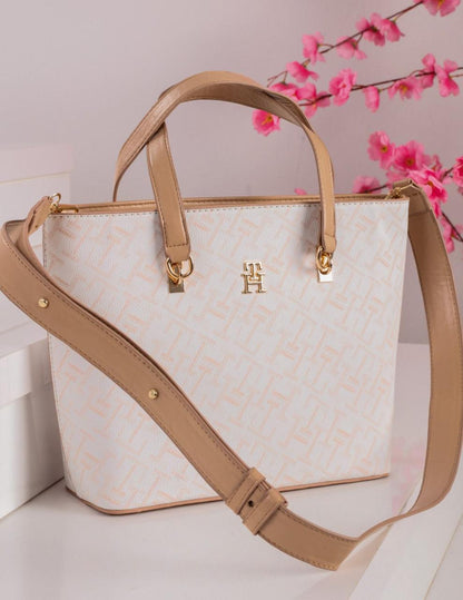 شنطة يد حريمي تومي