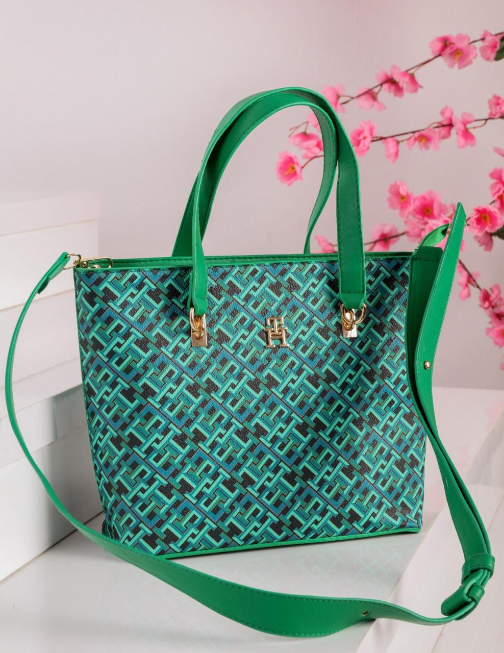 شنطة يد حريمي تومي