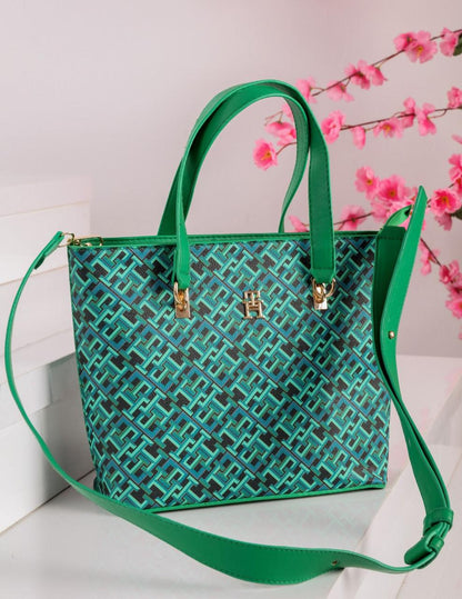 شنطة يد حريمي تومي