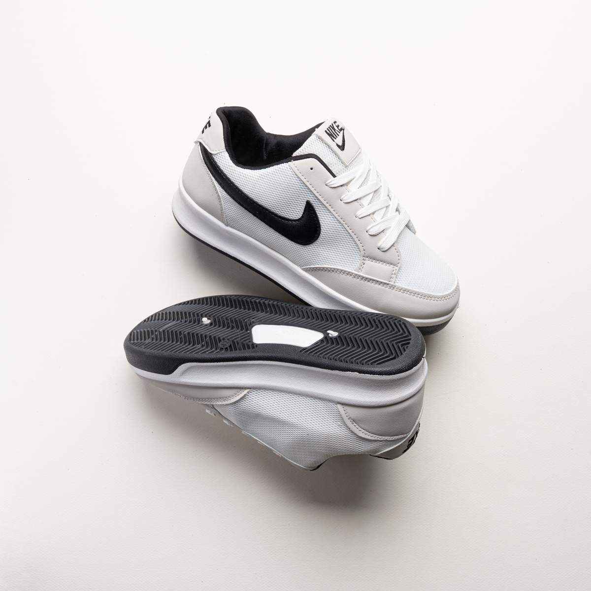 كوتشي نايك أدفيرسري رجالي